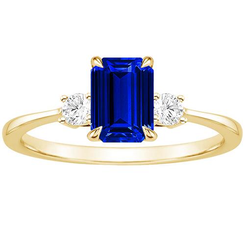 Anello in oro giallo con 3 pietre di smeraldo. zaffiro blu e diamante 3.50 carati - harrychadent.it