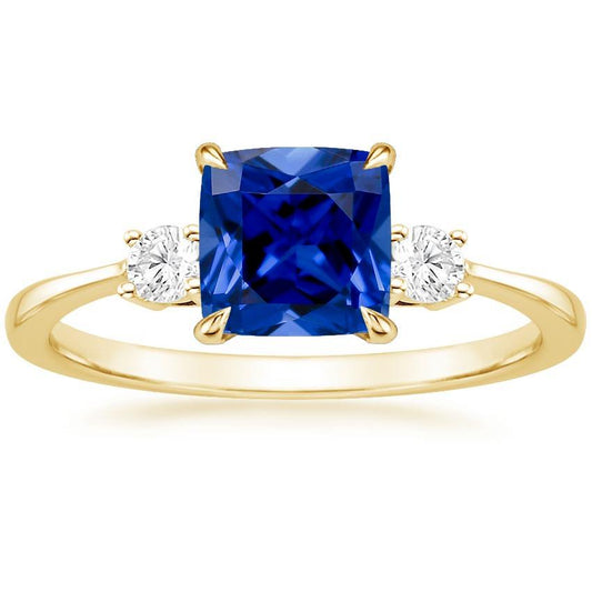 Anello in oro giallo con 3 pietre. diamante e cuscino. zaffiro blu 2.50 carati - harrychadent.it