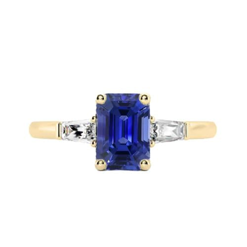 Anello in oro giallo con tre pietre e zaffiro blu smeraldo 2.50 carati - harrychadent.it