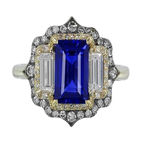 Anello in oro giallo e bianco con zaffiro blu taglio smeraldo e diamante 6.75 carati - harrychadent.it