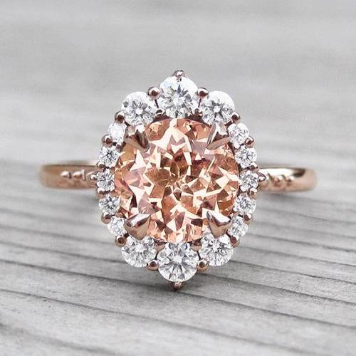 Anello in oro rosa 14 kt con Morganite e diamanti da 17.75 ct - harrychadent.it