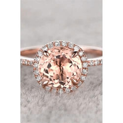 Anello in oro rosa 14 kt con Morganite e diamanti taglio rotondo 11.50 ct