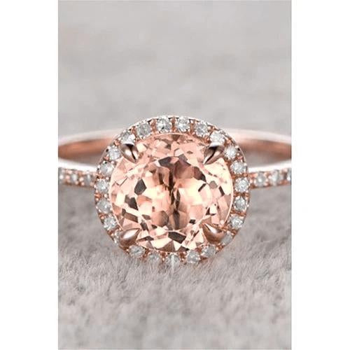 Anello in oro rosa 14 kt con Morganite e diamanti taglio rotondo 11.50 ct - harrychadent.it