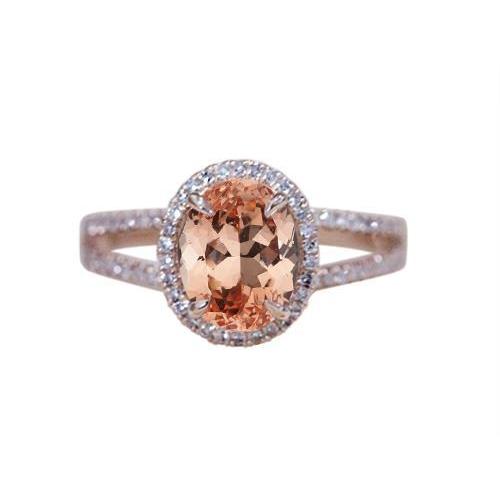 Anello in oro rosa con Morganite a taglio ovale e rotondo da 17.25 ct con diamanti - harrychadent.it