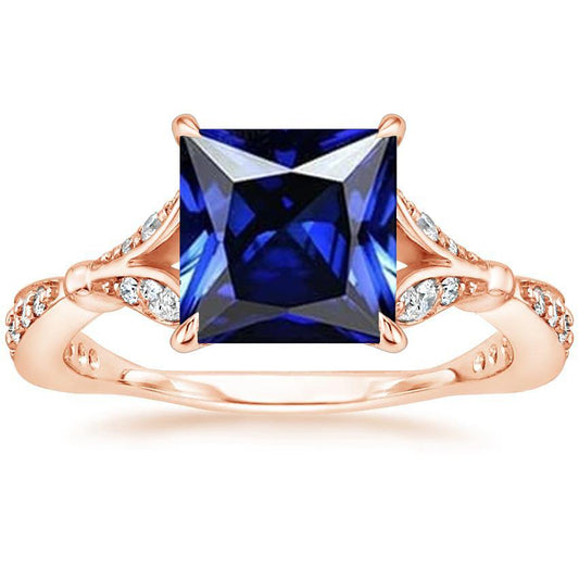 Anello in oro rosa con accenti di zaffiro blu taglio principessa 5.50 carati - harrychadent.it