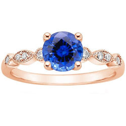Anello in oro rosa con diamante 2.50 carati stile vintage con zaffiro blu rotondo