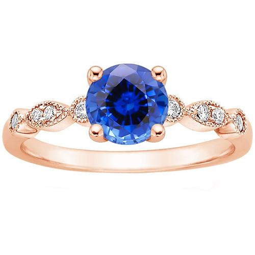 Anello in oro rosa con diamante 2.50 carati stile vintage con zaffiro blu rotondo - harrychadent.it