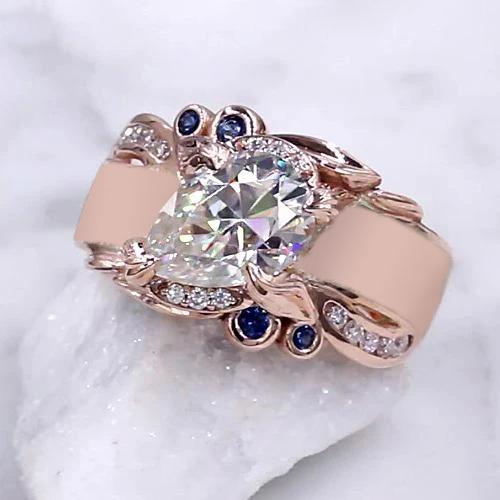 Anello in oro rosa con diamanti. 2.25 carati. gioielli con accenti di zaffiro di Ceylon - harrychadent.it
