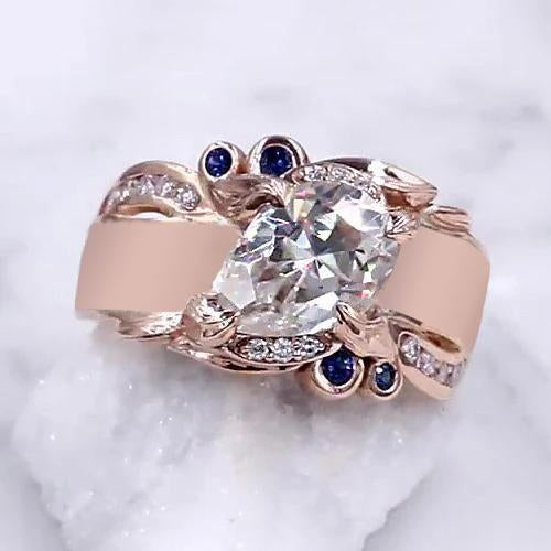 Anello in oro rosa con diamanti. 2.25 carati. gioielli con accenti di zaffiro di Ceylon - harrychadent.it