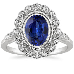 Anello in stile antico Halo con castone incastonato in zaffiro blu con diamanti 4 carati