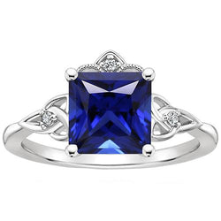 Anello in stile antico con piccolo diamante e zaffiro blu taglio principessa Oro 14K