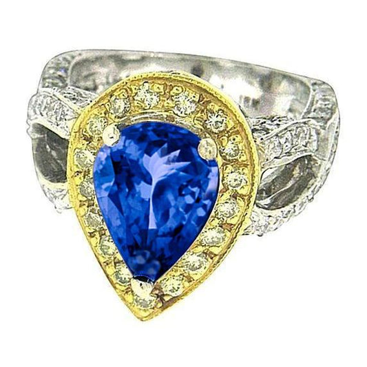 Anello in stile antico con tanzanite a pera e diamanti da 4,51 ct in oro bicolore - harrychadent.it