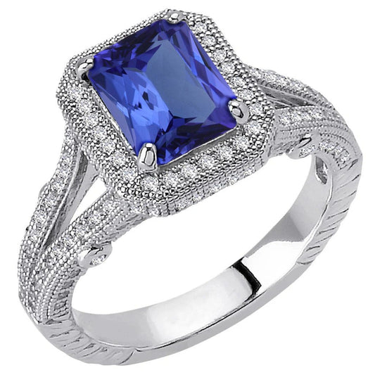 Anello in stile antico con tanzanite e diamanti da 4.51 carati in oro bianco - harrychadent.it