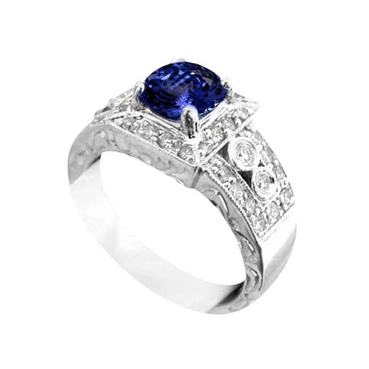 Anello in stile antico con tanzanite e diamanti. 2.79 carati. gioielli da sposa - harrychadent.it