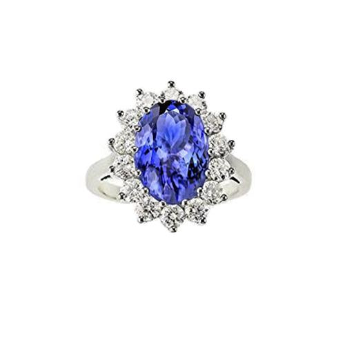 Anello in tanzanite ovale da 19.75 ct con diamanti stile fiore in oro 14 carati - harrychadent.it