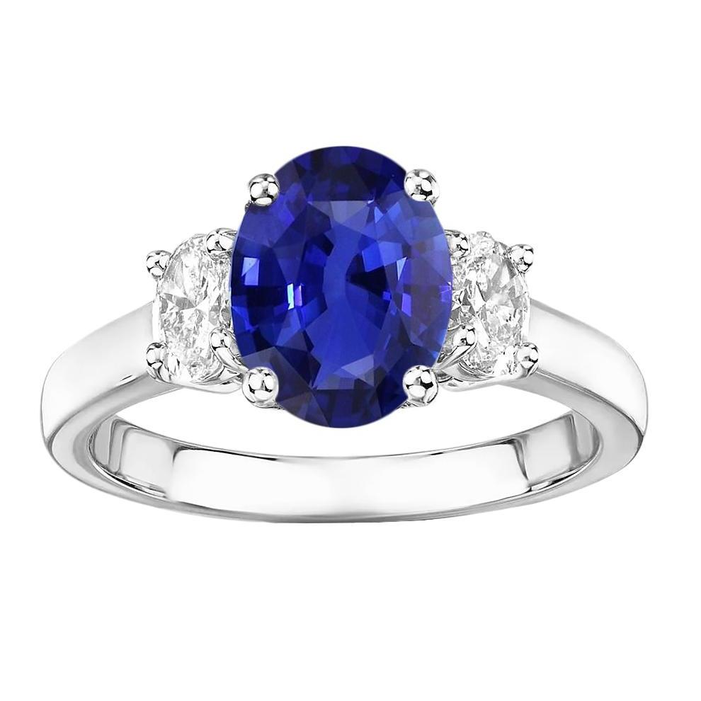 Anello ovale con 3 pietre di diamanti. oro bianco. zaffiro di Ceylon. 5 carati - harrychadent.it