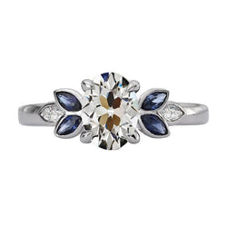 Anello ovale con diamanti a taglio antico e zaffiri blu marquise 6.50 carati