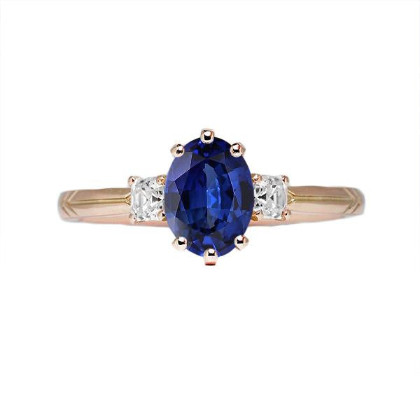 Anello ovale con tre pietre di zaffiro blu e diamanti 2.50 carati - harrychadent.it