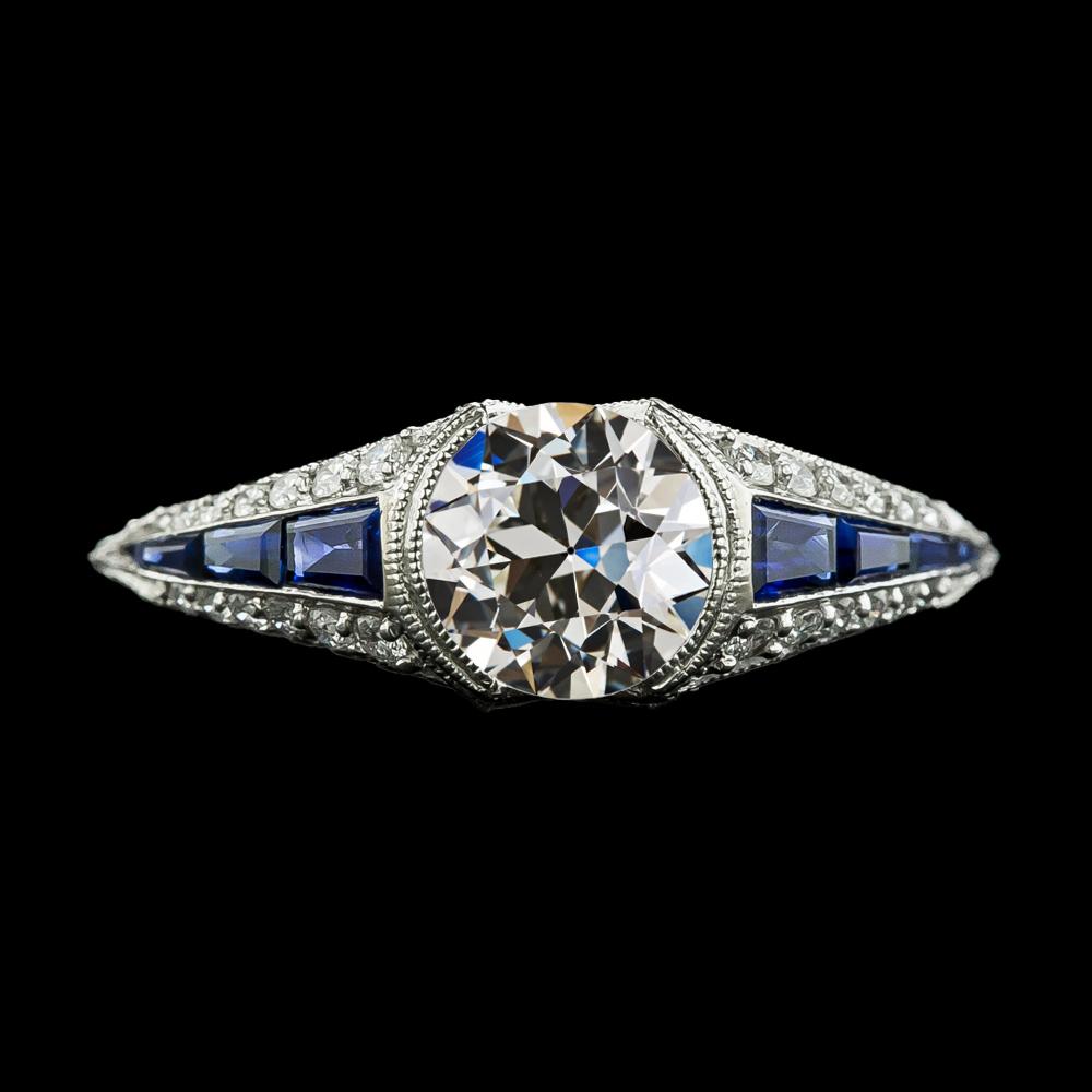 Anello rotondo con diamanti a taglio antico e zaffiri blu, mezza lunetta incastonata, 3,50 carati - harrychadent.it