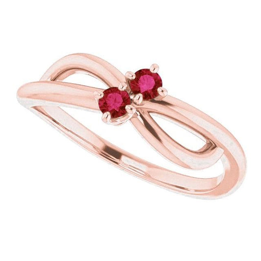 Anello rubino oro rosa 0.20 carati Infinity Twist Style U montatura a griffe - harrychadent.it