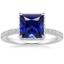 Anello solitario accento zaffiro blu e diamante 6 carati oro bianco
