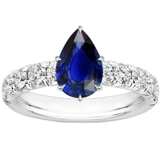 Anello solitario con accenti. pera. zaffiro blu e diamanti. 5 carati. pavé - harrychadent.it