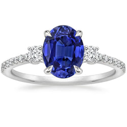Anello solitario con zaffiro blu 3,50 carati e diamanti tondi in oro bianco 14 carati