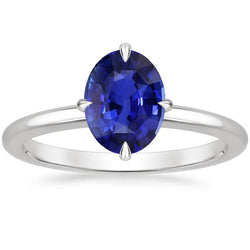 Anello solitario con zaffiro blu taglio ovale 3 carati incastonato