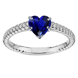 Anello solitario con zaffiro di Ceylon e pavé con accenti di diamanti 2.50 carati