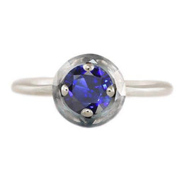 Anello solitario rotondo con zaffiro blu 1 carato e 4 griffe con pietre preziose