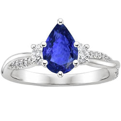 Anello stile 3 pietre con accenti diamante e zaffiro blu pera 6 carati