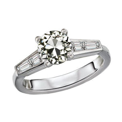 Baguette affusolata e anello di fidanzamento rotondo con diamante vecchio minatore 4 carati