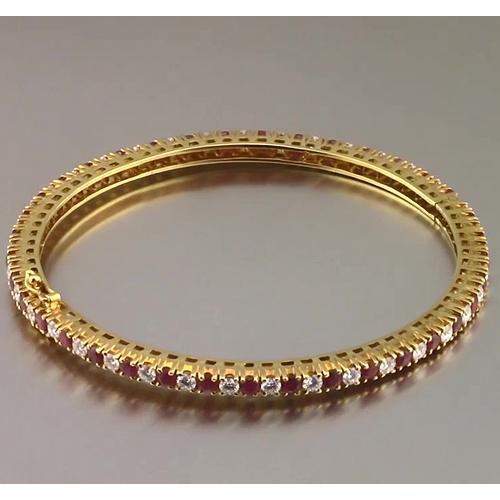 Bracciale tennis con rubini e diamanti 12.54 carati in oro giallo Novità - harrychadent.it