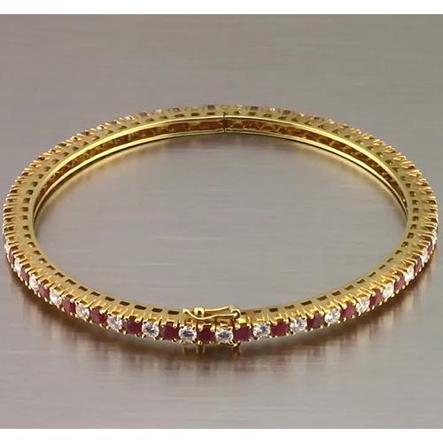 Bracciale tennis con rubini e diamanti 12.54 carati in oro giallo Novità - harrychadent.it