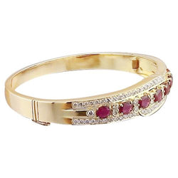 Braccialetto ovale con rubini e diamanti 20 carati in oro giallo 14K