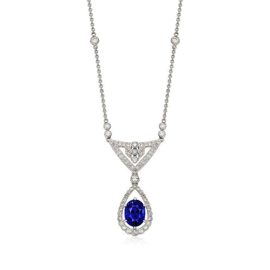 Ciondolo Halo in oro con zaffiro blu ovale e collana di diamanti 2 carati - harrychadent.it