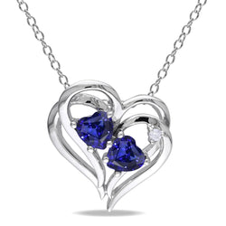 Ciondolo Love con zaffiro a cuore e diamanti rotondi in oro bianco da 2,50 carati