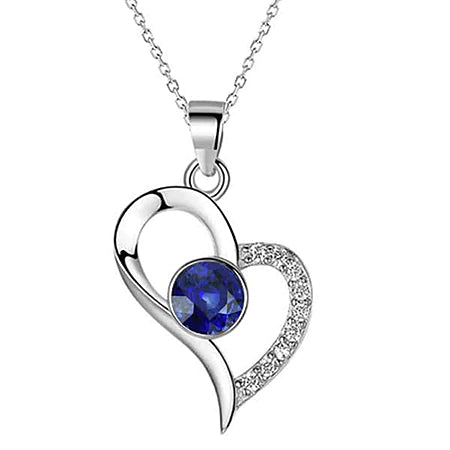 Ciondolo a cuore con zaffiro blu rotondo e collana di diamanti da 1,25 carati - harrychadent.it