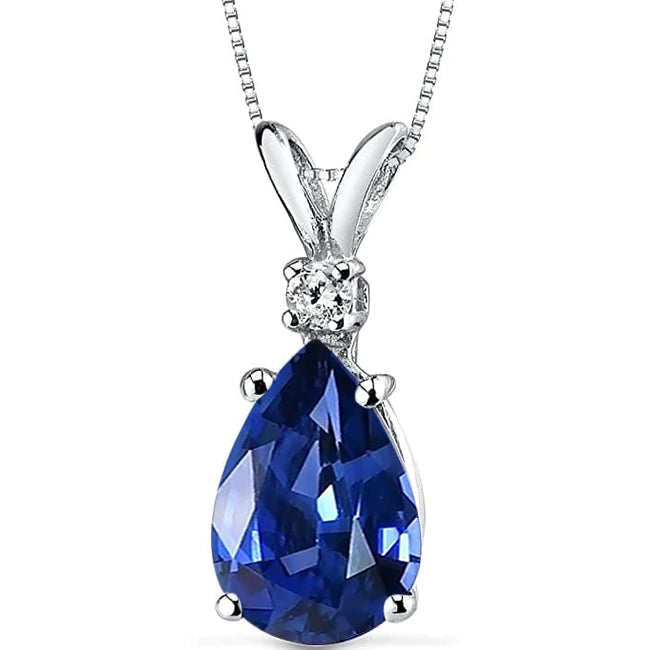 Ciondolo con diamanti rotondi e pera con zaffiro blu, set di 4 griffe, 4 carati - harrychadent.it