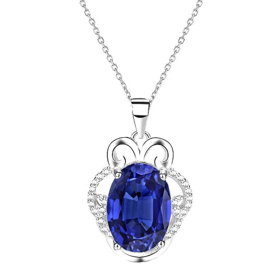 Ciondolo con zaffiro blu ovale fantasia e diamanti rotondi con cauzione 3,25 carati - harrychadent.it