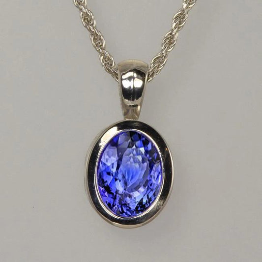Ciondolo in oro bianco 14K con tanzanite blu taglio ovale 14 kt con catena - harrychadent.it