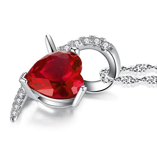 Collana Pendente a forma di cuore in oro bianco con rubini da 6.90 ct e diamanti - harrychadent.it
