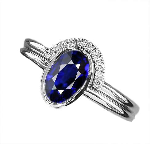 Fede nuziale con diamanti e zaffiro blu ovale. set 3 carati in oro bianco - harrychadent.it