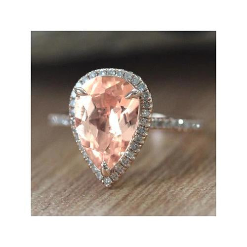 Fede nuziale in oro bianco 14 carati con pera Morganite e diamanti da 12.50 ct - harrychadent.it