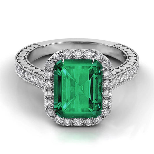 Fede nuziale in oro bianco con diamanti e smeraldo verde 21.50 ct - harrychadent.it