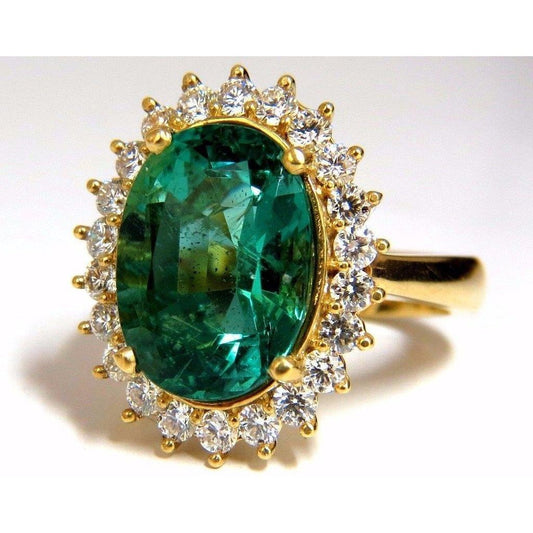 Fede nuziale in oro giallo 14 carati con smeraldo verde ovale da 11 ct - harrychadent.it