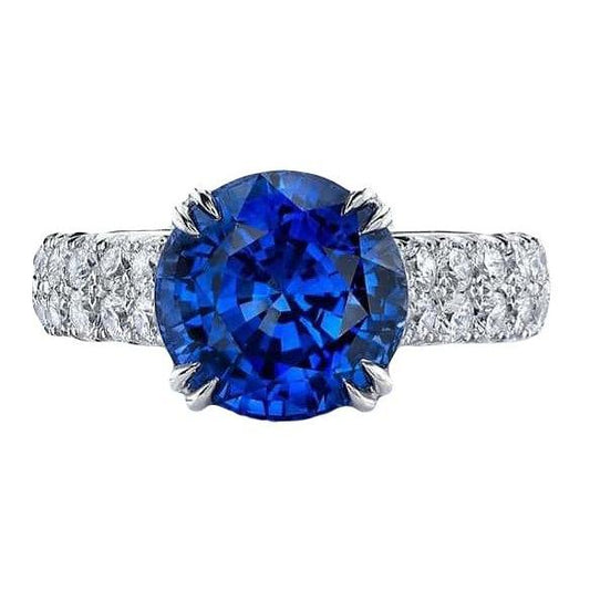 Grande anello rotondo con diamante. autentico zaffiro blu. 6 carati. con griffe in oro - harrychadent.it