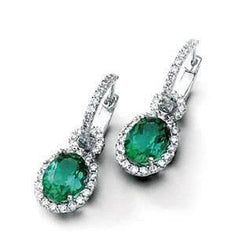 Orecchini pendenti con tormalina verde 10,70 carati e diamanti in oro bianco 14 carati
