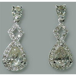 Paio di orecchini pendenti con diamanti a pera scintillanti da 3.50 carati WG 14K