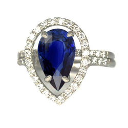 Set di fedi nuziali in oro con diamanti Halo. pera. zaffiro blu. 4 carati
